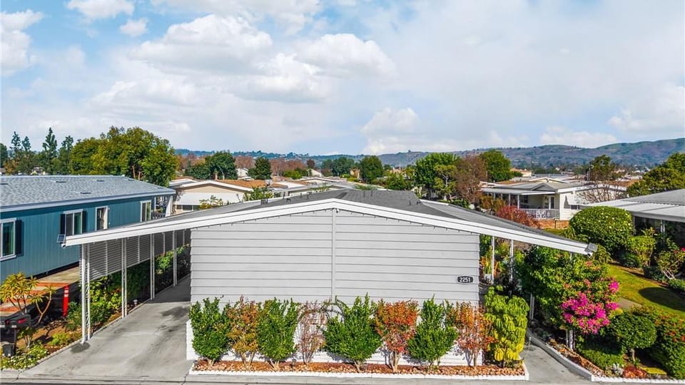 Lake Park La Habra home and neighborhood view with hills in the distance