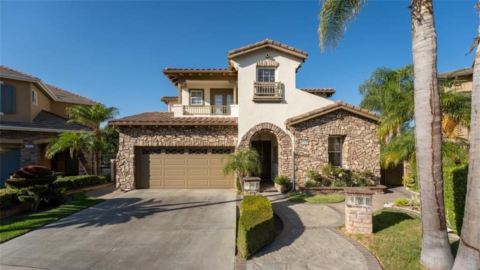 Westridge La Habra home exterior with stone facade and palm trees